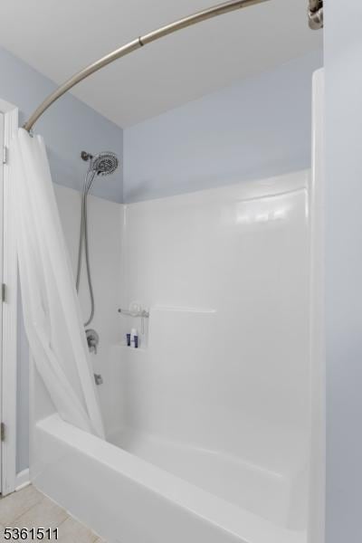 5 Caleb Ct, Hardyston Twp, NJ 07419 - bathroom with shower / bath combo and tile patterned floors