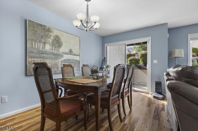 5 Caleb Ct, Hardyston Twp, NJ 07419 - dining area featuring a chandelier, wood finished floors, and baseboards