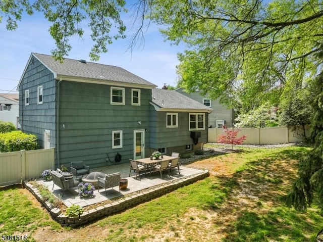 59 Eaton Pl, Bloomfield Twp, NJ 07003 - back of house featuring a shingled roof, a fenced backyard, and a patio