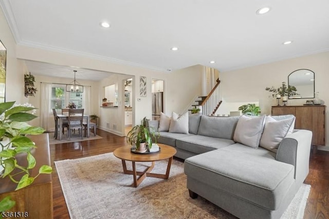 59 Eaton Pl, Bloomfield Twp, NJ 07003 - living area featuring stairway, a chandelier, wood finished floors, crown molding, and recessed lighting