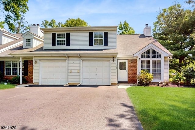 301 Smithwold Rd, Franklin Twp, NJ 08873 - traditional home featuring driveway, a front yard, an attached garage, a chimney, and brick siding