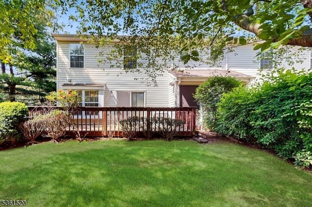 301 Smithwold Rd, Franklin Twp, NJ 08873 - rear view of property featuring a deck and a lawn