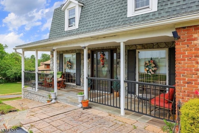 933 River Rd, Hillsborough Twp, NJ 08844 - doorway to property featuring a shingled roof, mansard roof, and a porch