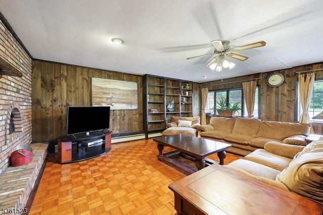 933 River Rd, Hillsborough Twp, NJ 08844 - living area featuring wood walls, a ceiling fan, a baseboard heating unit, attic access, and built in shelves