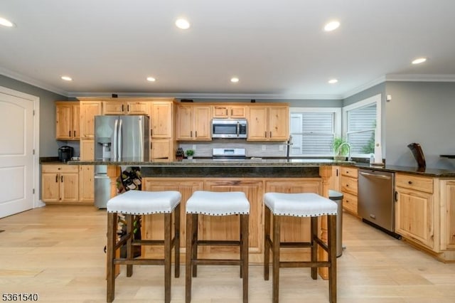 307 Squaw Trl, Hopatcong Boro, NJ 07821 - kitchen with appliances with stainless steel finishes, light brown cabinetry, ornamental molding, a kitchen bar, and recessed lighting
