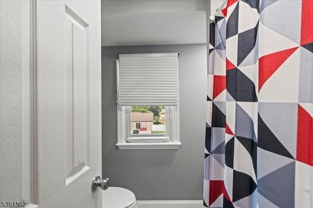 10 Hanover Ave, Hanover Twp, NJ 07981 - bathroom featuring toilet, baseboards, and a shower with curtain
