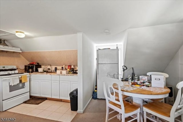 10 Hanover Ave, Hanover Twp, NJ 07981 - kitchen featuring white range with electric cooktop, freestanding refrigerator, white cabinets, extractor fan, and a sink