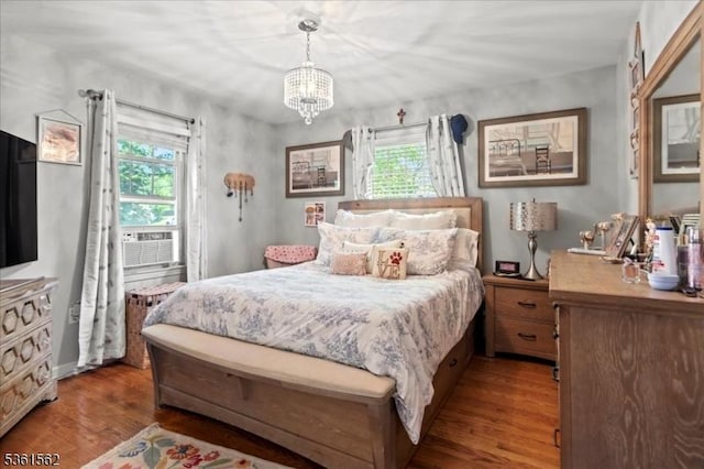 10 Hanover Ave, Hanover Twp, NJ 07981 - bedroom featuring multiple windows, wood finished floors, and a chandelier