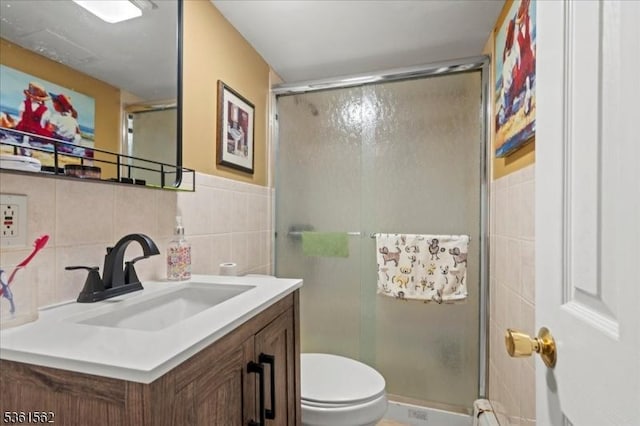 10 Hanover Ave, Hanover Twp, NJ 07981 - full bathroom featuring vanity, toilet, a stall shower, and tile walls