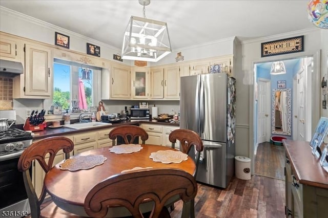 10 Hanover Ave, Hanover Twp, NJ 07981 - kitchen with appliances with stainless steel finishes, cream cabinets, dark countertops, and crown molding