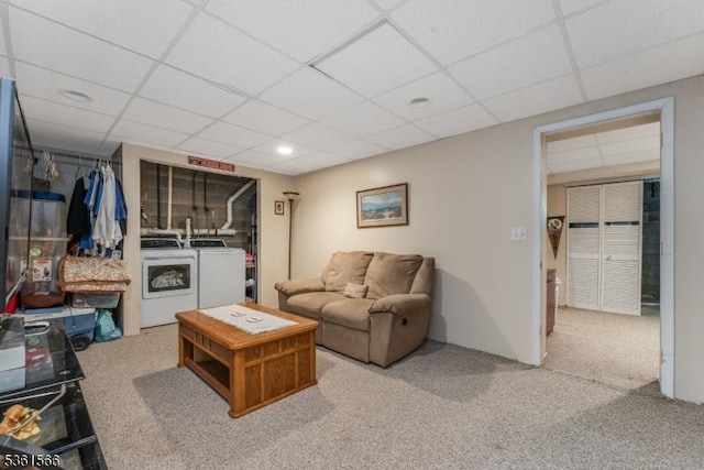 205 Burlington Ct, Raritan Twp, NJ 08822 - carpeted living room with washer and clothes dryer and a paneled ceiling
