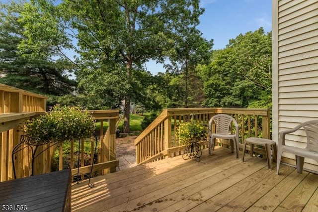205 Burlington Ct, Raritan Twp, NJ 08822 - wooden terrace featuring view of scattered trees