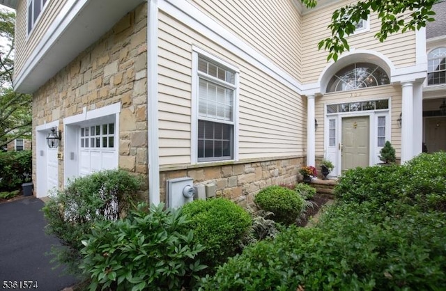 302 Lindabury Ln, Tewksbury Twp, NJ 07979 - property entrance with stone siding