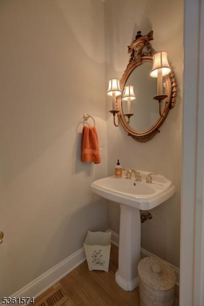 302 Lindabury Ln, Tewksbury Twp, NJ 07979 - bathroom with wood finished floors and baseboards