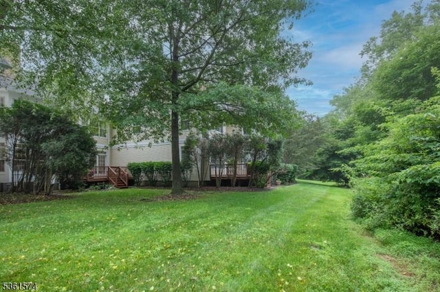 302 Lindabury Ln, Tewksbury Twp, NJ 07979 - view of green lawn with a wooden deck