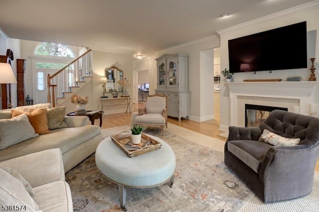 302 Lindabury Ln, Tewksbury Twp, NJ 07979 - living area with stairs, light wood finished floors, crown molding, and a fireplace