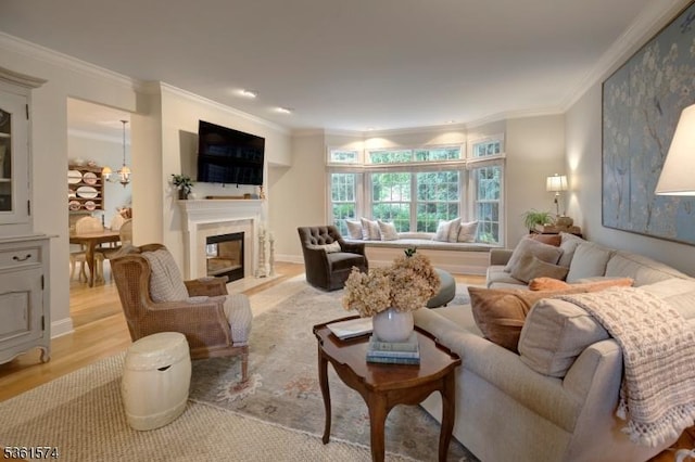 302 Lindabury Ln, Tewksbury Twp, NJ 07979 - living area with ornamental molding, light wood-style floors, and a fireplace with flush hearth