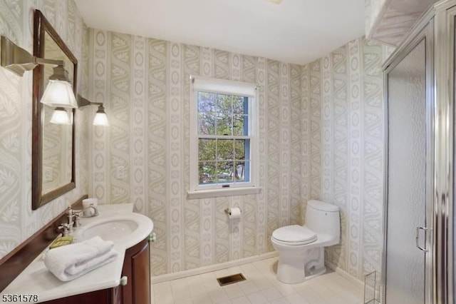 50H New England Ave Unit H, Summit City, NJ 07901 - full bathroom with vanity, a stall shower, toilet, wallpapered walls, and tile patterned flooring