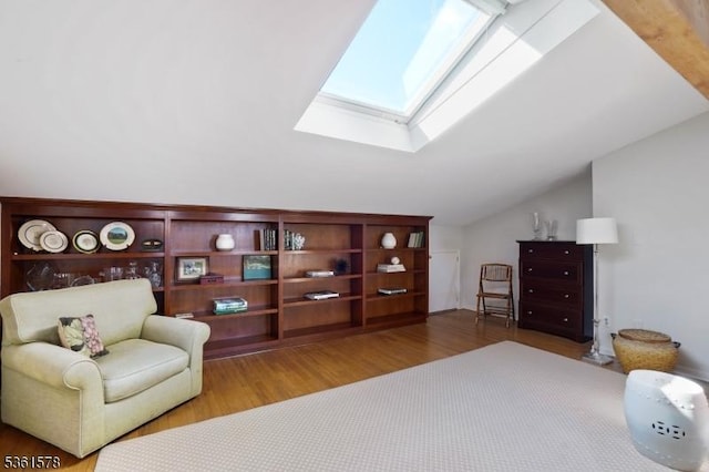 50H New England Ave Unit H, Summit City, NJ 07901 - living area with a skylight, lofted ceiling, and wood finished floors