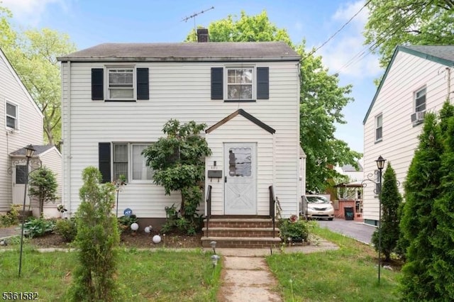 420 Hollywood Ave, Hillside Twp, NJ 07205 - view of front of home with entry steps and a chimney