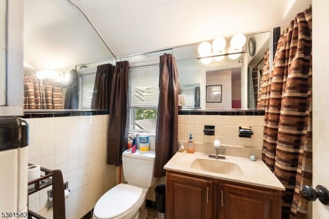 420 Hollywood Ave, Hillside Twp, NJ 07205 - bathroom with tile walls, toilet, and vanity