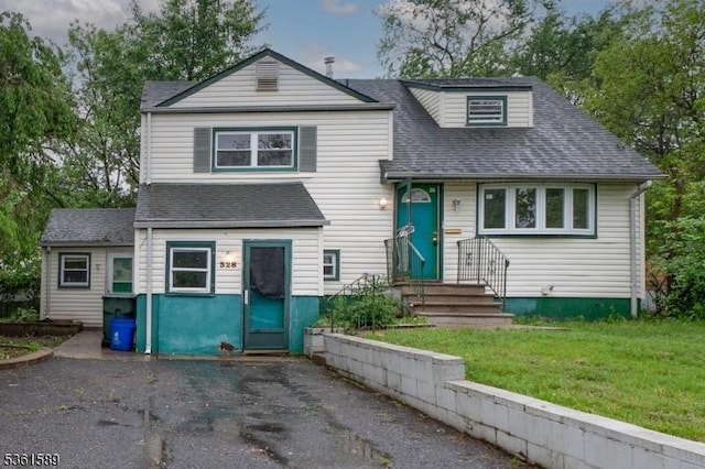 328 Ralph St, Franklin Twp, NJ 08873 - view of front of house with a shingled roof and a front yard