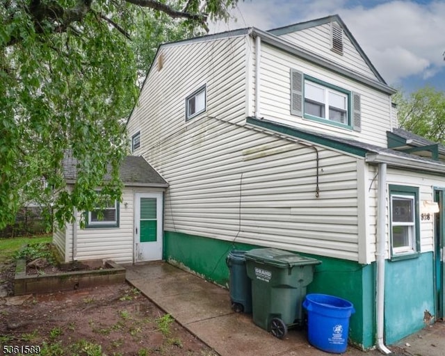 328 Ralph St, Franklin Twp, NJ 08873 - view of home's exterior featuring a shingled roof