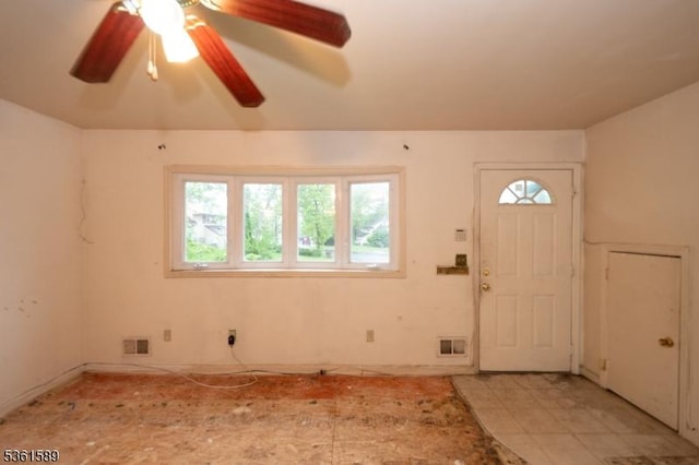 328 Ralph St, Franklin Twp, NJ 08873 - foyer with healthy amount of natural light and ceiling fan