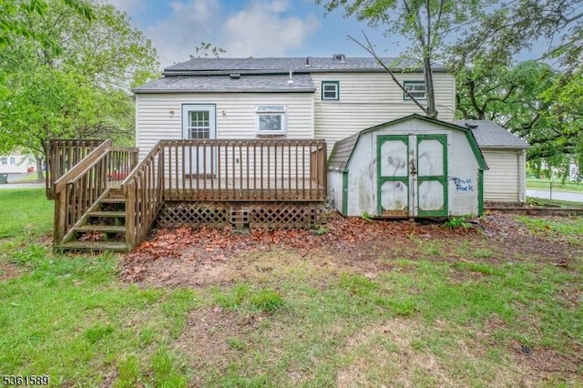 328 Ralph St, Franklin Twp, NJ 08873 - rear view of property with a deck, a garage, and a yard