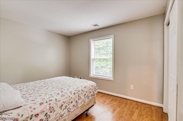 73-81 Mariners Ct, Plainfield City, NJ 07063 - bedroom with light wood-type flooring and a closet
