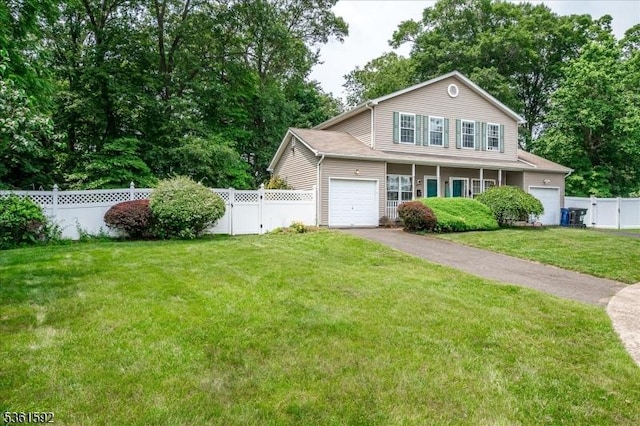 73-81 Mariners Ct, Plainfield City, NJ 07063 - view of front of home featuring an attached garage and asphalt driveway