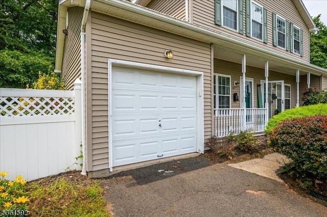 73-81 Mariners Ct, Plainfield City, NJ 07063 - view of front of house with a porch and an attached garage