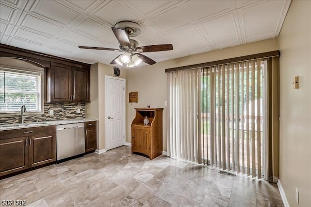 73-81 Mariners Ct, Plainfield City, NJ 07063 - kitchen with dishwasher, ceiling fan, dark brown cabinetry, and decorative backsplash