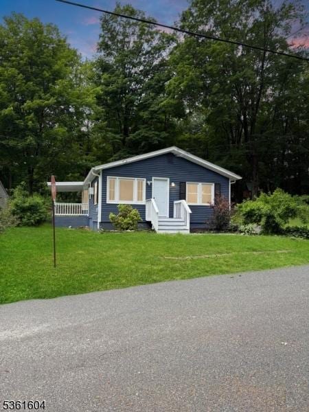 12 Sunrise Dr, Wantage Twp, NJ 07461 - bungalow-style home with a yard