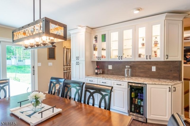 10 Mountainview Rd, Roxbury Twp, NJ 07876 - indoor bar featuring beverage cooler, freestanding refrigerator, and backsplash
