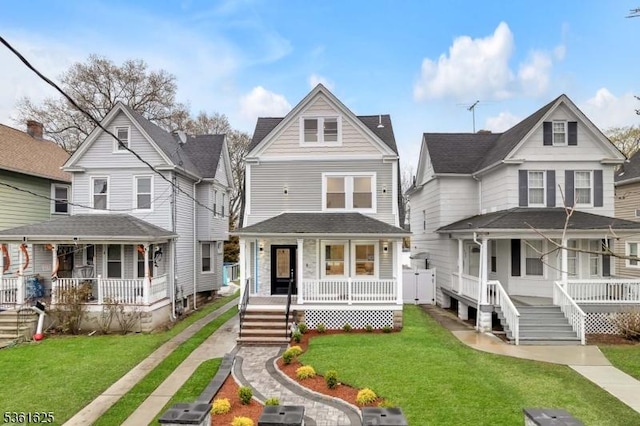 139 Weaver Ave, Bloomfield Twp, NJ 07003 - view of front facade with covered porch and a front lawn