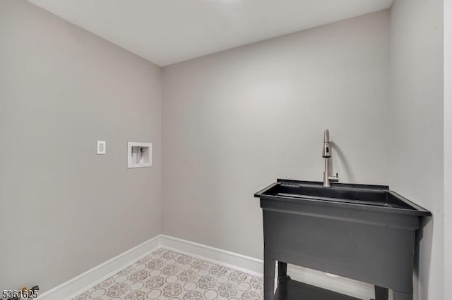 139 Weaver Ave, Bloomfield Twp, NJ 07003 - laundry area featuring baseboards and washer hookup