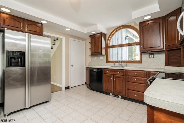 90 Libertyville Rd, Wantage Twp, NJ 07461 - kitchen with stainless steel refrigerator with ice dispenser, dishwasher, light floors, light countertops, and a sink