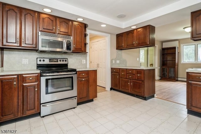 90 Libertyville Rd, Wantage Twp, NJ 07461 - kitchen with stainless steel appliances, light countertops, light floors, and recessed lighting