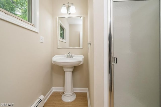 90 Libertyville Rd, Wantage Twp, NJ 07461 - full bath with a stall shower, wood finished floors, and baseboards