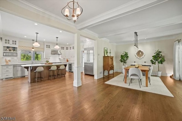 7 Shenandoah Ct, Washington Twp, NJ 07830 - dining room with dark wood-type flooring, recessed lighting, beam ceiling, a chandelier, and crown molding