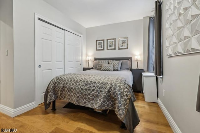 3315 Pleasant Ave Unit 314, Union City, NJ 07087 - bedroom with a closet, baseboards, and wood finished floors
