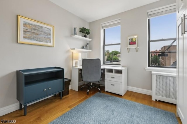 3315 Pleasant Ave Unit 314, Union City, NJ 07087 - office space featuring radiator, wood finished floors, and baseboards