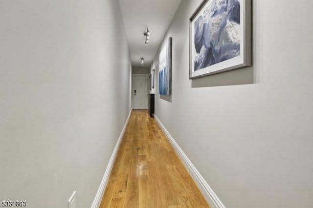 3315 Pleasant Ave Unit 314, Union City, NJ 07087 - hallway with light wood-type flooring and baseboards