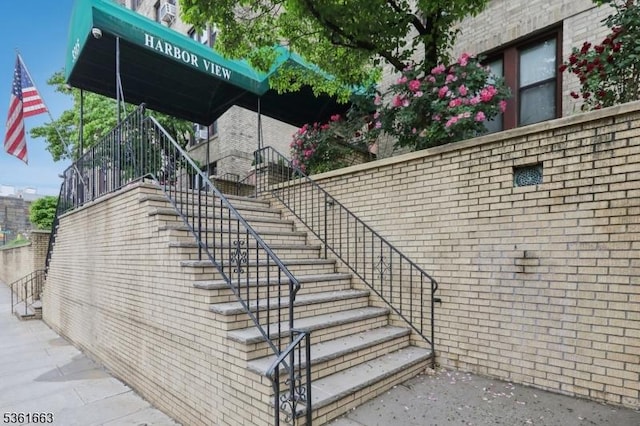 3315 Pleasant Ave Unit 314, Union City, NJ 07087 - view of side of home featuring stairs and brick siding