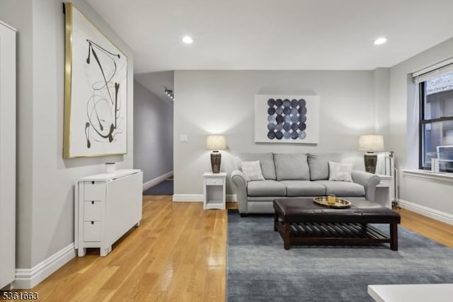 3315 Pleasant Ave Unit 314, Union City, NJ 07087 - living area with light wood-style floors, baseboards, and recessed lighting