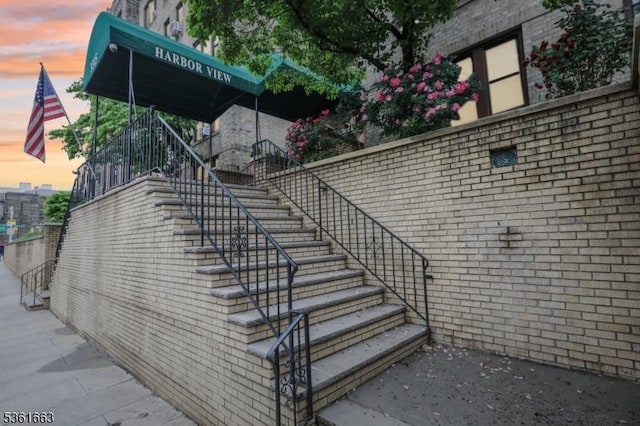 3315 Pleasant Ave Unit 314, Union City, NJ 07087 - view of side of home featuring stairs and brick siding