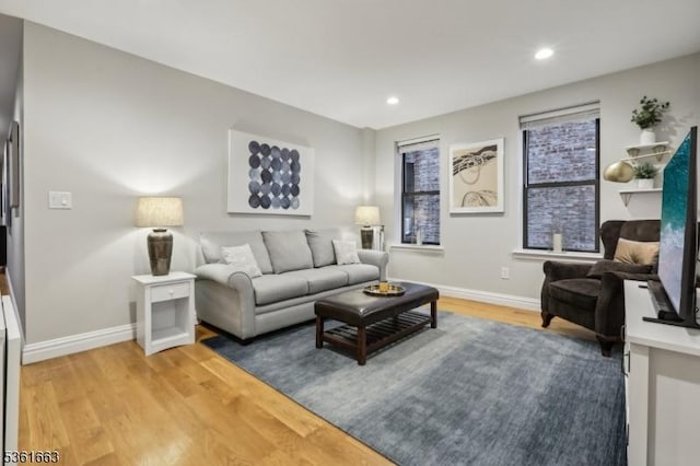3315 Pleasant Ave Unit 314, Union City, NJ 07087 - living area featuring baseboards, light wood-style floors, and recessed lighting