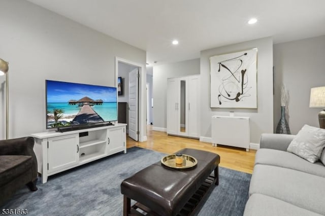 3315 Pleasant Ave Unit 314, Union City, NJ 07087 - living room featuring wood finished floors, recessed lighting, and baseboards