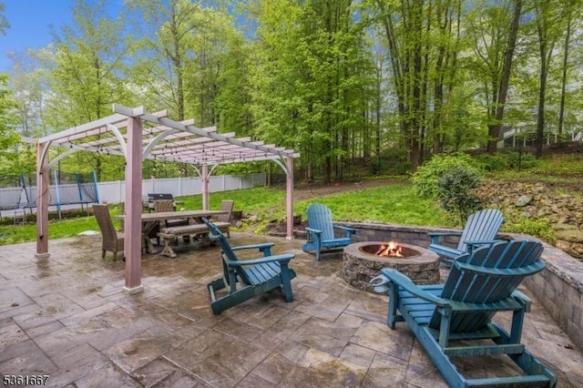 16 Old Chimney Rd, Randolph Twp, NJ 07869 - view of patio / terrace with a fire pit, a pergola, a trampoline, and outdoor dining area